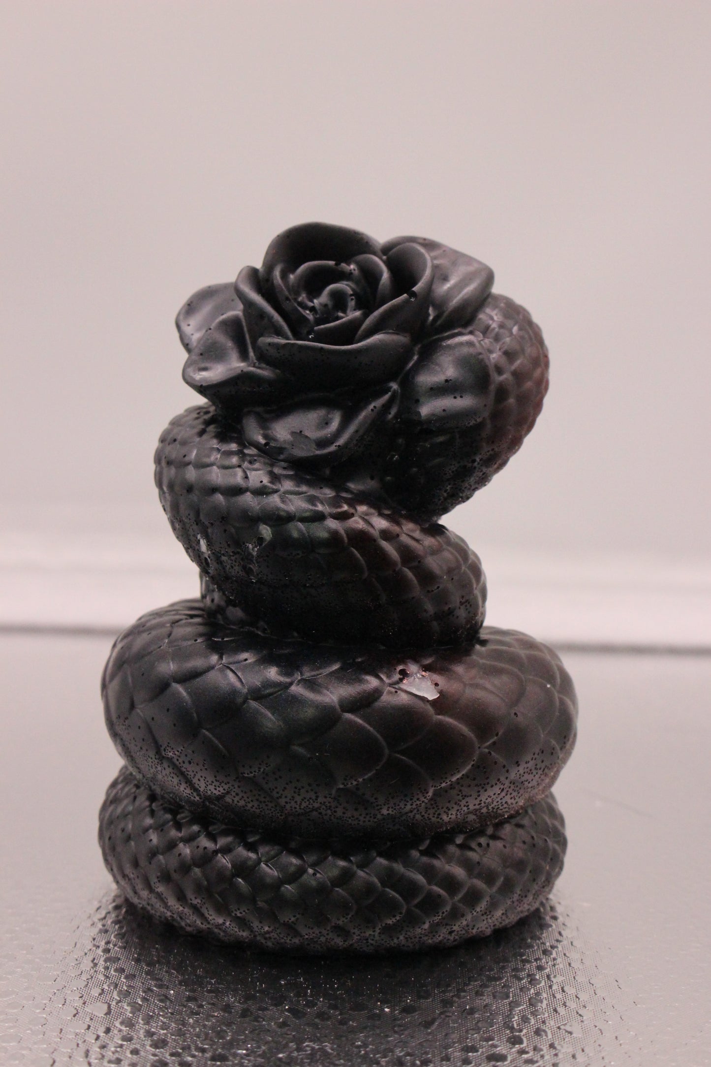 Resin snake with rose
