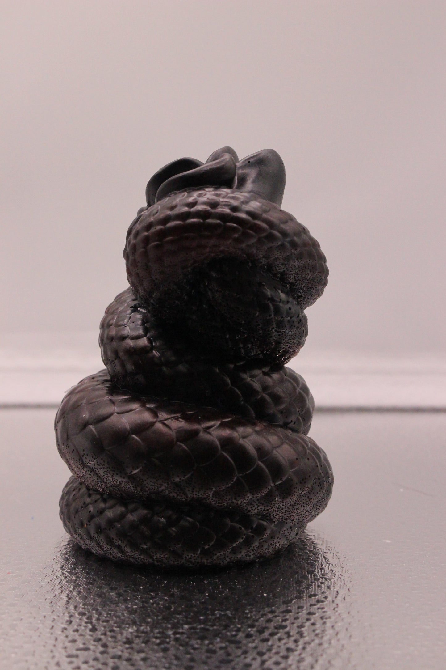 Resin snake with rose