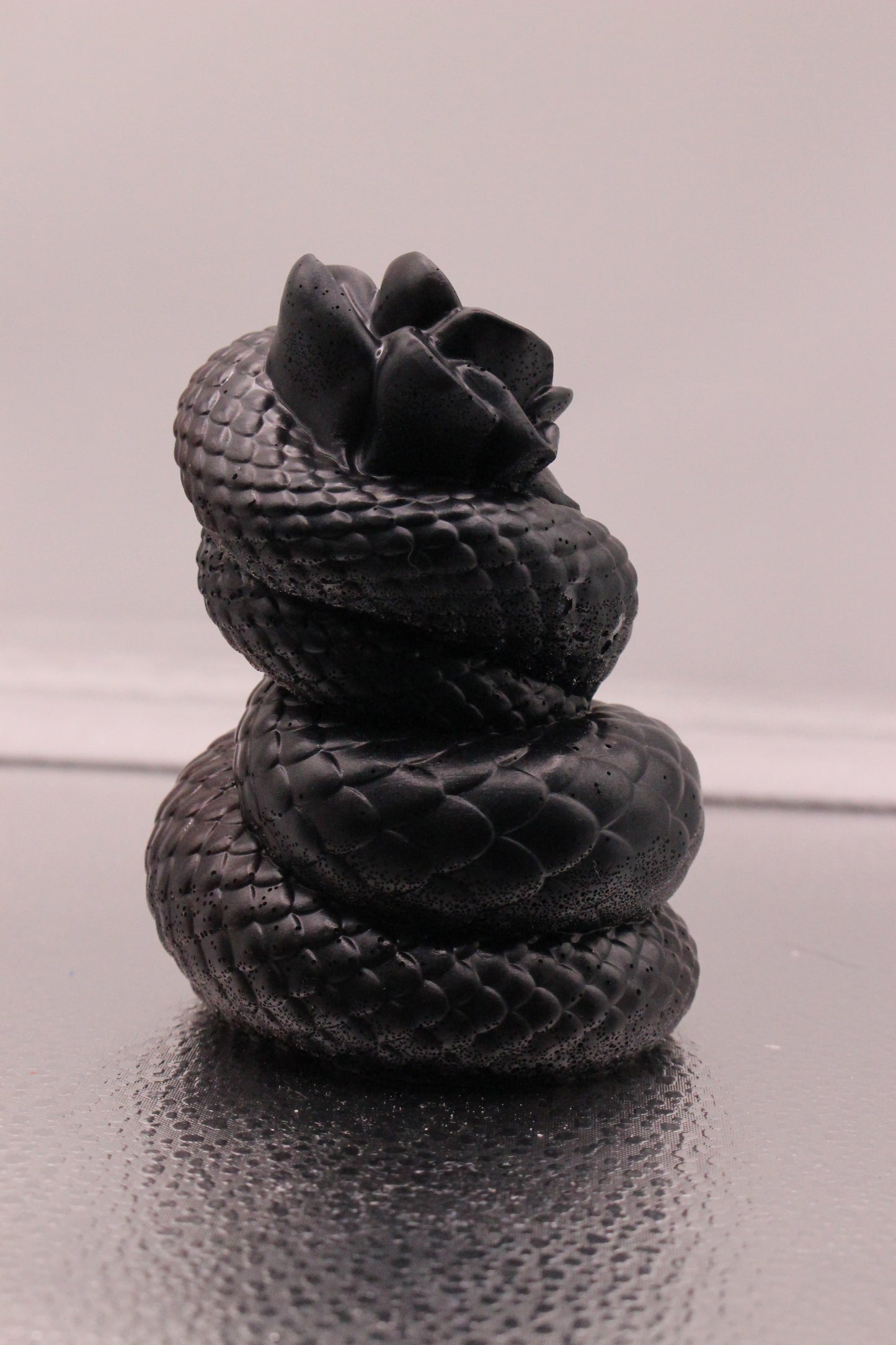 Resin snake with rose