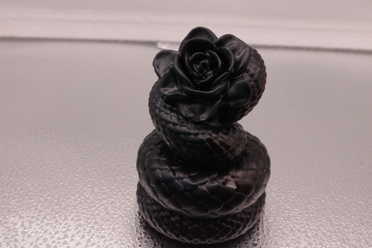 Resin snake with rose