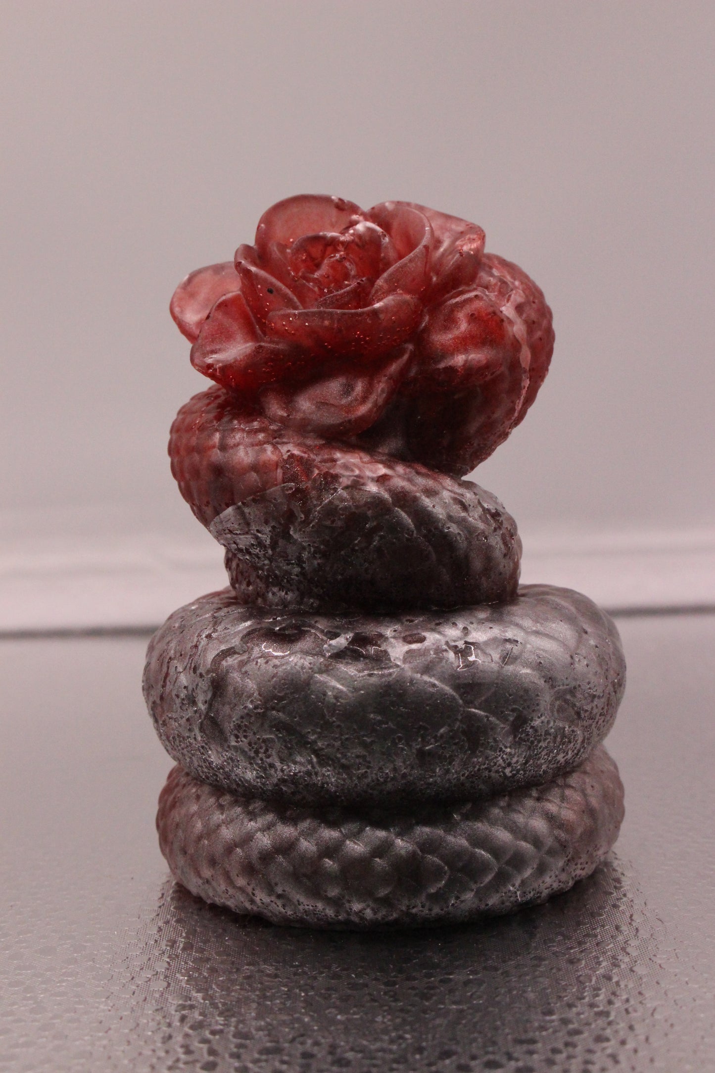 Resin snake with rose