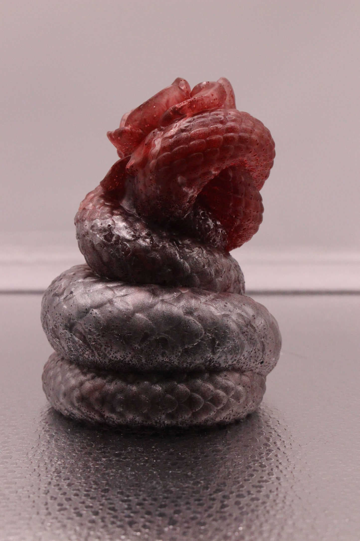 Resin snake with rose